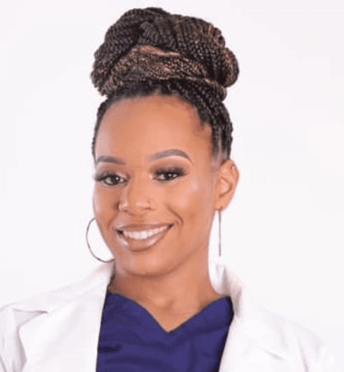 Smiling healthcare professional with braided bun
