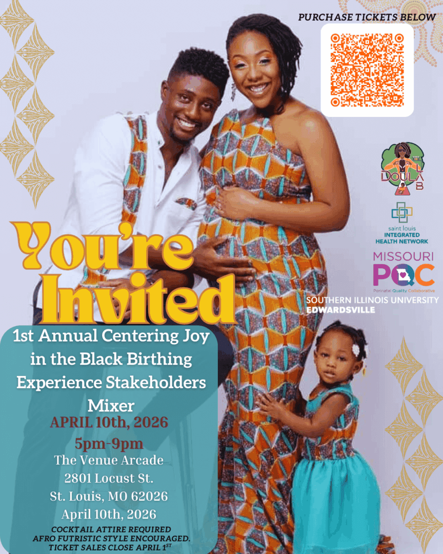 Pregnant couple and child in matching Ankara outfits